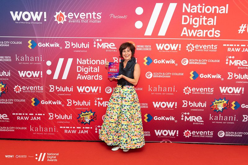 Comtec CEO with the award